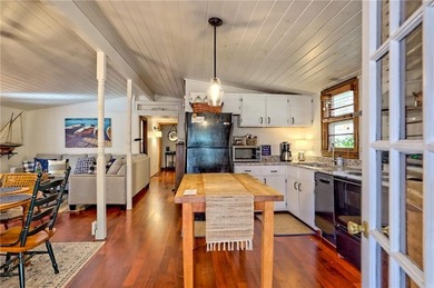 Charming Lake Burton Cottage with Deeded Lake Access - Under on Waterfall Country Club in Georgia - for sale on GolfHomes.com, golf home, golf lot