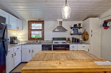 Charming Lake Burton Cottage with Deeded Lake Access - Under on Waterfall Country Club in Georgia - for sale on GolfHomes.com, golf home, golf lot