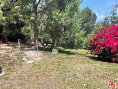 Coveted Gated community Finisterra On The Green, On the Golf on Casta del Sol Golf Course in California - for sale on GolfHomes.com, golf home, golf lot