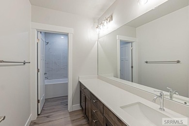 Prepare to be captivated! This brand-new 2025 twin home (2,824 on Sage Lakes Municipal Golf Course in  - for sale on GolfHomes.com, golf home, golf lot