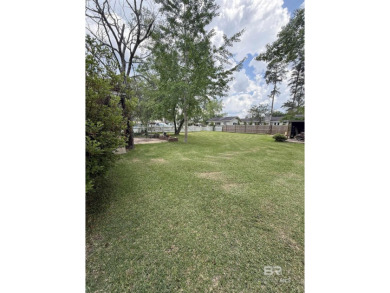 Charming 3-bedroom, 2-bath home conveniently located in town on Vanity Fair Golf and Tennis Club in Alabama - for sale on GolfHomes.com, golf home, golf lot