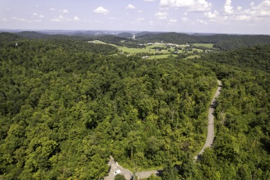 Wooded & peaceful building lot at The Highlands of Eagles Nest on Eagles Nest Country Club in Kentucky - for sale on GolfHomes.com, golf home, golf lot