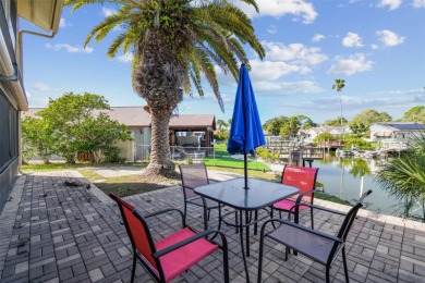 Bring your boat and enjoy tropical Florida living to the max in on Gulf Harbors Golf Course in Florida - for sale on GolfHomes.com, golf home, golf lot