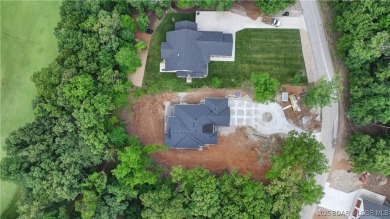 Stunning New Construction  Reverse 1.5 Story  Modern Farmhouse on The Club At Porto Cima in Missouri - for sale on GolfHomes.com, golf home, golf lot