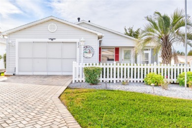 This home is a beautiful 2br 2ba home with 1 and half garages on Briarwood Executive Golf Course in Florida - for sale on GolfHomes.com, golf home, golf lot
