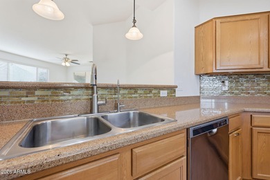 FRESHLY PAINTED Two Bedroom plus den/bedroom, Large Great room on Sundance Golf Club in Arizona - for sale on GolfHomes.com, golf home, golf lot