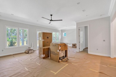 With the newly extended front porch, this enhanced Brady has all on Origins Golf Club in Florida - for sale on GolfHomes.com, golf home, golf lot