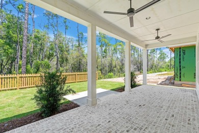 With the newly extended front porch, this enhanced Brady has all on Origins Golf Club in Florida - for sale on GolfHomes.com, golf home, golf lot