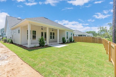 With the newly extended front porch, this enhanced Brady has all on Origins Golf Club in Florida - for sale on GolfHomes.com, golf home, golf lot