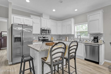 Truly a BOATER'S PARADISE -park your boat, jet-ski in your yard on Brick Landing Plantation Yacht and Golf Club in North Carolina - for sale on GolfHomes.com, golf home, golf lot