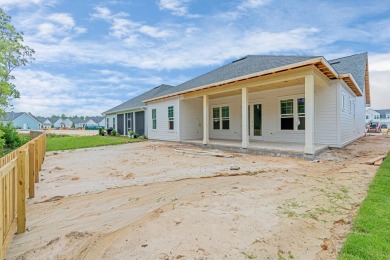 With the newly extended front porch, this enhanced Brady has all on Origins Golf Club in Florida - for sale on GolfHomes.com, golf home, golf lot