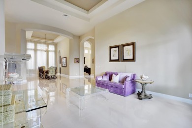 Step into luxury with this beautifully updated 3-bedroom on Mizner Country Club in Florida - for sale on GolfHomes.com, golf home, golf lot