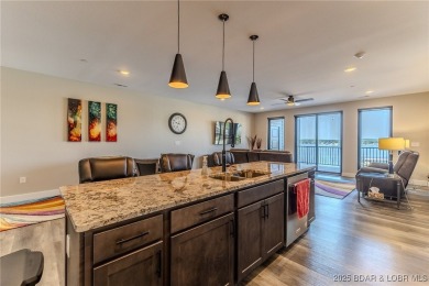 This newly constructed condo at Mile Marker 13 is an ideal on Seasons Ridge At Four Seasons in Missouri - for sale on GolfHomes.com, golf home, golf lot