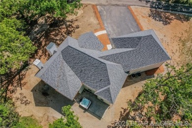 Step into the epitome of luxurious living at The Estates of on The Club At Old Kinderhook in Missouri - for sale on GolfHomes.com, golf home, golf lot