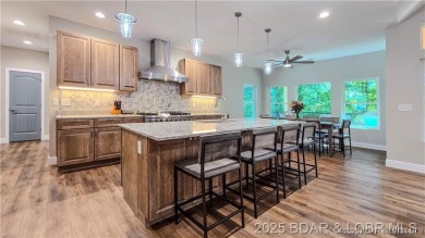 Step into the epitome of luxurious living at The Estates of on The Club At Old Kinderhook in Missouri - for sale on GolfHomes.com, golf home, golf lot