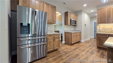 Step into the epitome of luxurious living at The Estates of on The Club At Old Kinderhook in Missouri - for sale on GolfHomes.com, golf home, golf lot