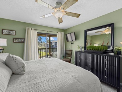 Explore this captivating second-story unit, presenting a on Bird Bay Executive Golf Club in Florida - for sale on GolfHomes.com, golf home, golf lot