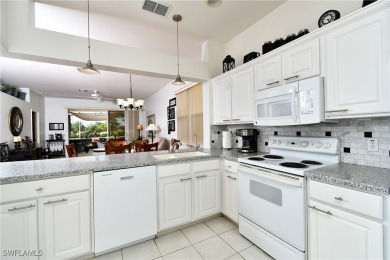 Turnkey twin villa with extended lanai overlooking the golf on Westminster Golf Club in Florida - for sale on GolfHomes.com, golf home, golf lot