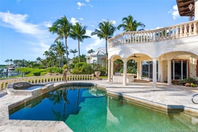 This 8,000-sq.-ft. Mediterranean masterpiece in exclusive on Sailfish Point Golf Club, Inc. in Florida - for sale on GolfHomes.com, golf home, golf lot