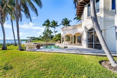 This 8,000-sq.-ft. Mediterranean masterpiece in exclusive on Sailfish Point Golf Club, Inc. in Florida - for sale on GolfHomes.com, golf home, golf lot