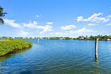 This 8,000-sq.-ft. Mediterranean masterpiece in exclusive on Sailfish Point Golf Club, Inc. in Florida - for sale on GolfHomes.com, golf home, golf lot