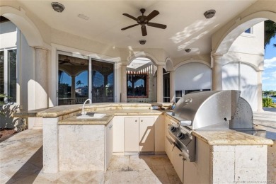 This 8,000-sq.-ft. Mediterranean masterpiece in exclusive on Sailfish Point Golf Club, Inc. in Florida - for sale on GolfHomes.com, golf home, golf lot