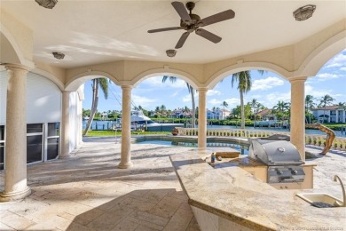 This 8,000-sq.-ft. Mediterranean masterpiece in exclusive on Sailfish Point Golf Club, Inc. in Florida - for sale on GolfHomes.com, golf home, golf lot