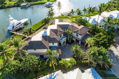 This 8,000-sq.-ft. Mediterranean masterpiece in exclusive on Sailfish Point Golf Club, Inc. in Florida - for sale on GolfHomes.com, golf home, golf lot