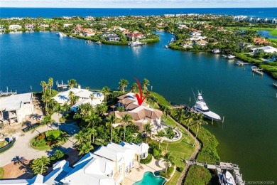 This 8,000-sq.-ft. Mediterranean masterpiece in exclusive on Sailfish Point Golf Club, Inc. in Florida - for sale on GolfHomes.com, golf home, golf lot