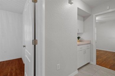 This meticulously maintained, gorgeous Alexander Custom-Built on Oak Hills Country Club in Florida - for sale on GolfHomes.com, golf home, golf lot