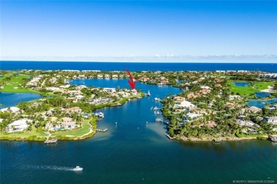 This 8,000-sq.-ft. Mediterranean masterpiece in exclusive on Sailfish Point Golf Club, Inc. in Florida - for sale on GolfHomes.com, golf home, golf lot