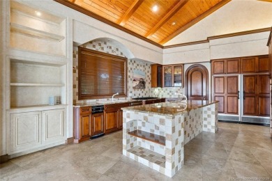 This 8,000-sq.-ft. Mediterranean masterpiece in exclusive on Sailfish Point Golf Club, Inc. in Florida - for sale on GolfHomes.com, golf home, golf lot