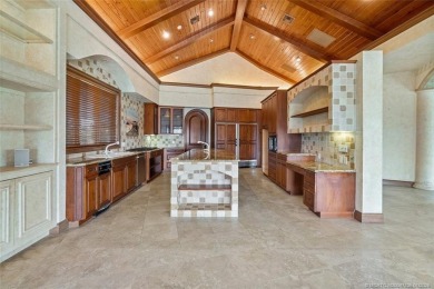 This 8,000-sq.-ft. Mediterranean masterpiece in exclusive on Sailfish Point Golf Club, Inc. in Florida - for sale on GolfHomes.com, golf home, golf lot