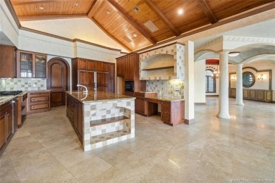 This 8,000-sq.-ft. Mediterranean masterpiece in exclusive on Sailfish Point Golf Club, Inc. in Florida - for sale on GolfHomes.com, golf home, golf lot