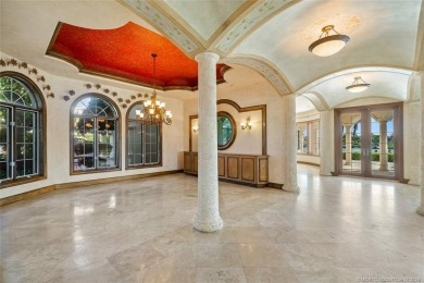 This 8,000-sq.-ft. Mediterranean masterpiece in exclusive on Sailfish Point Golf Club, Inc. in Florida - for sale on GolfHomes.com, golf home, golf lot