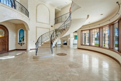 This 8,000-sq.-ft. Mediterranean masterpiece in exclusive on Sailfish Point Golf Club, Inc. in Florida - for sale on GolfHomes.com, golf home, golf lot