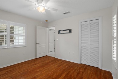 Under contract-accepting backup offers. This meticulously on Oak Hills Country Club in Florida - for sale on GolfHomes.com, golf home, golf lot