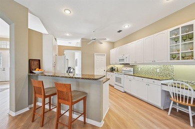 Beautiful, well-maintained three-bedroom, two-bath pool home is on The Venice Golf and Country Club in Florida - for sale on GolfHomes.com, golf home, golf lot