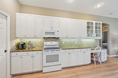 Beautiful, well-maintained three-bedroom, two-bath pool home is on The Venice Golf and Country Club in Florida - for sale on GolfHomes.com, golf home, golf lot