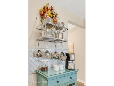 Welcome to 1728 Culdees Lane in Avalon - where coastal charm on Lennon Hills Golf Course in North Carolina - for sale on GolfHomes.com, golf home, golf lot