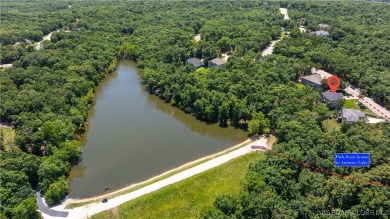 Immaculate Four Seasons home situated on an interior lake! This on Seasons Ridge At Four Seasons in Missouri - for sale on GolfHomes.com, golf home, golf lot
