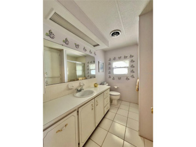 Charming 2-Bedroom, 2-Bath Home with Incredible Potential in on Fairway Village Golf Course in Florida - for sale on GolfHomes.com, golf home, golf lot