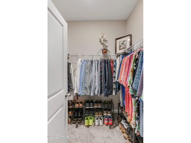 Coastal style meets everyday ease at 1728 Culdees Lane in Avalon on Lennon Hills Golf Course in North Carolina - for sale on GolfHomes.com, golf home, golf lot