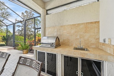 Beautiful, well-maintained three-bedroom, two-bath pool home is on The Venice Golf and Country Club in Florida - for sale on GolfHomes.com, golf home, golf lot