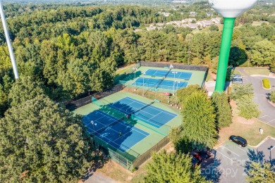 This beautifully appointed Saussy Burbank home showcases premium on Tega Cay Golf Club in South Carolina - for sale on GolfHomes.com, golf home, golf lot