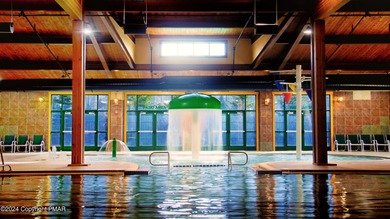 This Timber Trails three-generation family home in Lake Naomi on Lake Naomi Timber Trails Golf Club in Pennsylvania - for sale on GolfHomes.com, golf home, golf lot