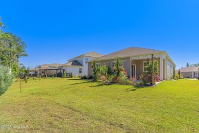 Coastal style meets everyday ease at 1728 Culdees Lane in Avalon on Lennon Hills Golf Course in North Carolina - for sale on GolfHomes.com, golf home, golf lot