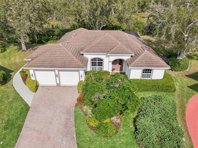 Beautiful, well-maintained three-bedroom, two-bath pool home is on The Venice Golf and Country Club in Florida - for sale on GolfHomes.com, golf home, golf lot