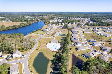 Coastal style meets everyday ease at 1728 Culdees Lane in Avalon on Lennon Hills Golf Course in North Carolina - for sale on GolfHomes.com, golf home, golf lot