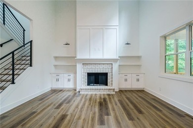 PRICE IMPROVEMENT! RELOCATION! MOVE-IN READY! THOUSANDS OF on Traditions of Braselton Golf Club in Georgia - for sale on GolfHomes.com, golf home, golf lot